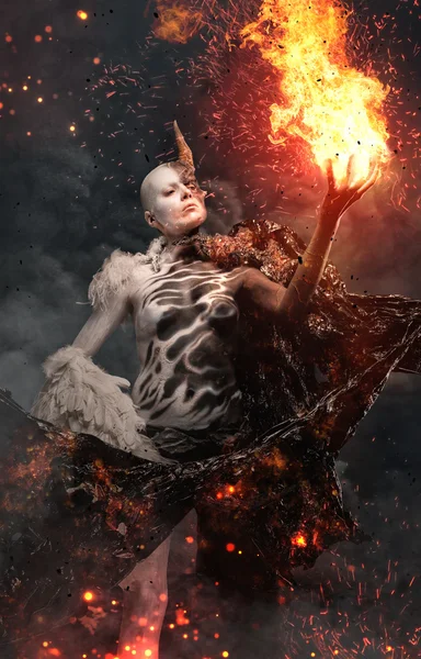 Devil woman with horn in a fire — Stock Photo, Image