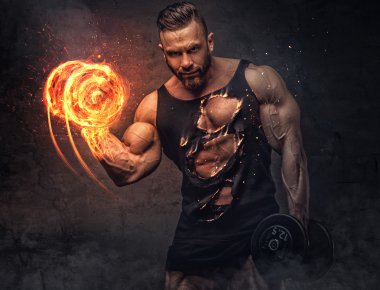   dumbbell yanma ile vücut geliştirmeci.