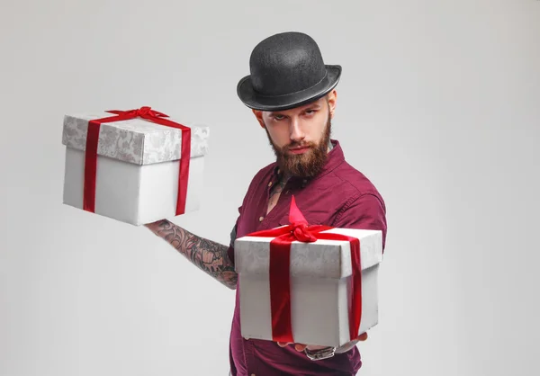 Bearded male with gift boxes — Stock Photo, Image
