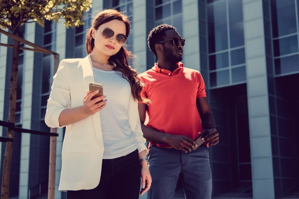 Female in sunglasses with afro american guy — Stock Photo, Image