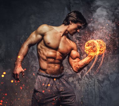 Dumbbell yanma ile bir adam portresi.