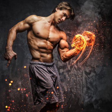 Dumbbell yanma ile bir adam portresi.
