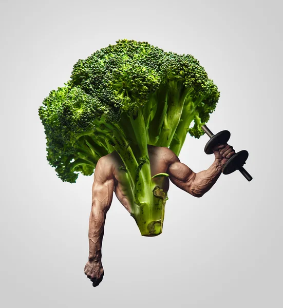 Broccoli with muscular man's hands. — Stock Photo, Image