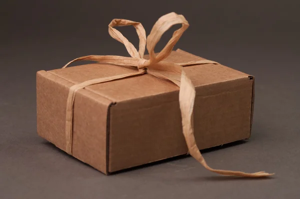 Paper gift box with bow — Stock Photo, Image