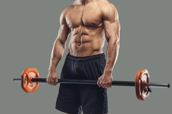 Een man bedrijf barbell — Stockfoto