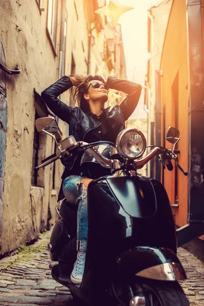 Casual girl on moto scooter. — Stock Photo, Image