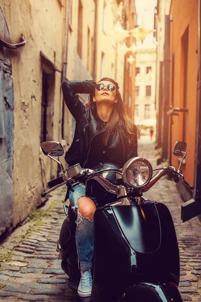 Casual girl on moto scooter. — Stock Photo, Image