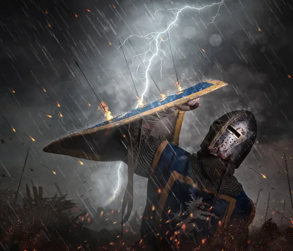 A knight with lightning strikes — Stock Photo, Image