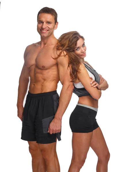 Sonriente pareja deportiva — Foto de Stock