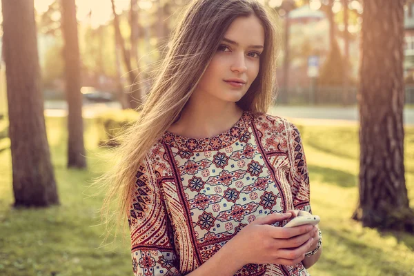 Awesome young female with smartphone — Stock Photo, Image