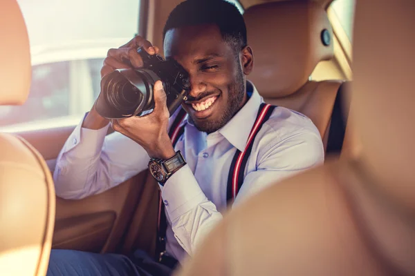 African man shooting with dslr camera — Stock Photo, Image