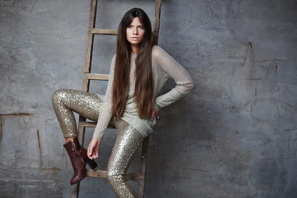 Brunette female in shiny costume — Stock Photo, Image