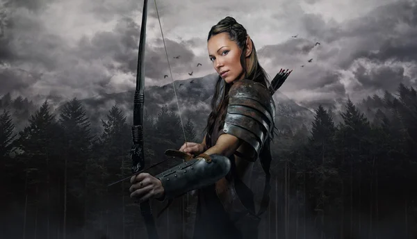 Elf woman in armor holding bow — Stock Photo, Image