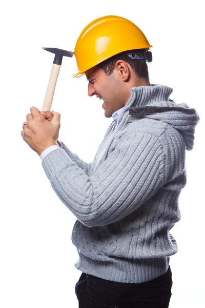 Male in safe helmet holding hummer — Stock Photo, Image