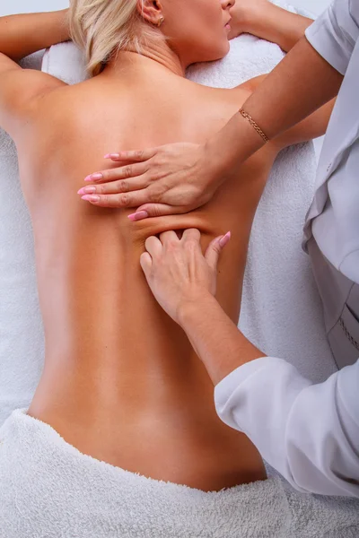 Female enjoying hand massage — Stock Photo, Image