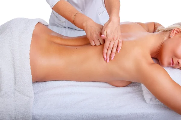 Жінка насолоджується масажем спини — стокове фото