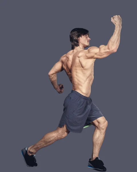 アクションで上半身裸の筋肉男性 — ストック写真