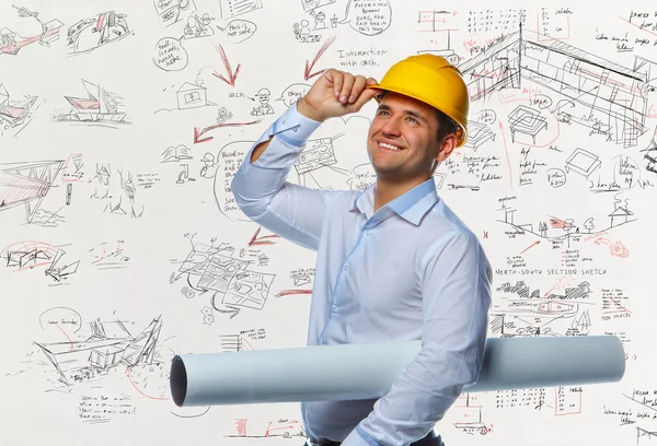 Engineer worker with drawing tube — Stock Photo, Image