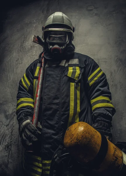 Firefighter in safety uniform — Stock Photo, Image