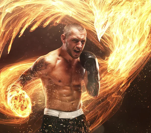 Fighter's burning punch — Stock Photo, Image