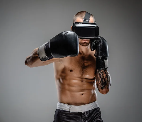 Boxing fighter in virtual reality glasses — Stock Photo, Image