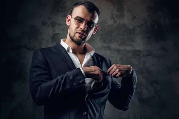 Male in sunglasses and grey business jacket — Stock Photo, Image