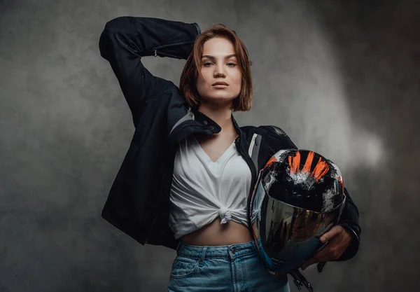 Glamour girl in white shirt with helmet poses in gray background — Stock Photo, Image