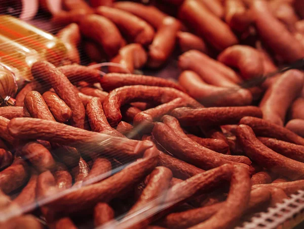 Butcher shops counter with large selection of raw meat — Stock Photo, Image