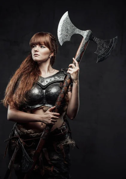 Dangerous northern woman armed with two handed axe — Stock Photo, Image