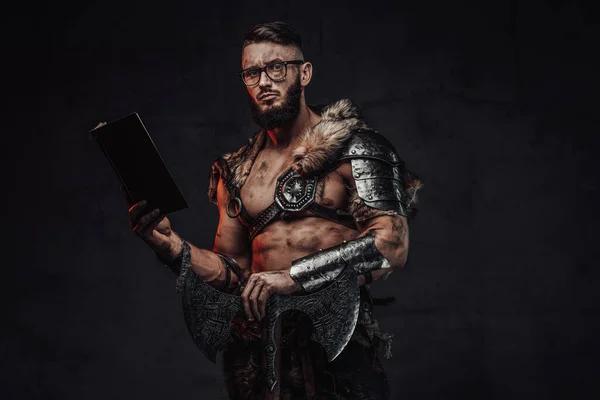 Clever nordic warrior with glasses book and huge axe — Stock Photo, Image