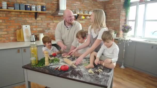 Young happy active family of five caucasian laughing, playing together. — Stock Video