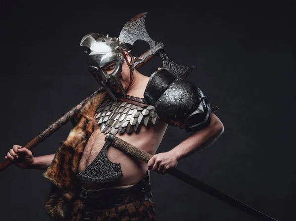 Weared in armor gladiator with belly and axes — Stock Photo, Image