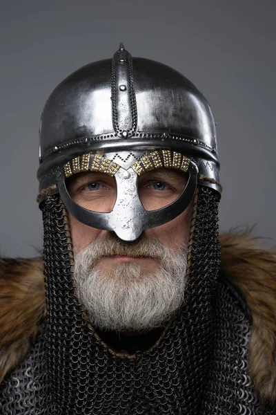 Closeup portrait of elder viking warrior with helmet — Zdjęcie stockowe