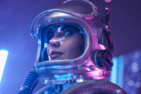 Headshot of spacewoman with helmet in fog — Stock Photo, Image