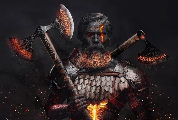 Ancient demonic warrior with axes against dark background — Stock Photo, Image