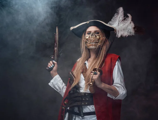 Dangerous woman corsair with mask and weapons — Stock Photo, Image