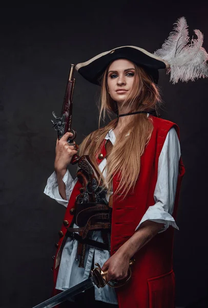 Caribbean female pirate with red coat and tricorn — Stock Photo, Image