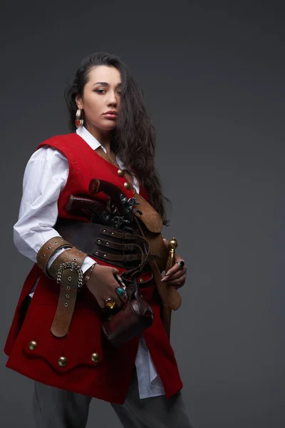 Rich female buccaneer in red jacket and white shirt — Stock Photo, Image