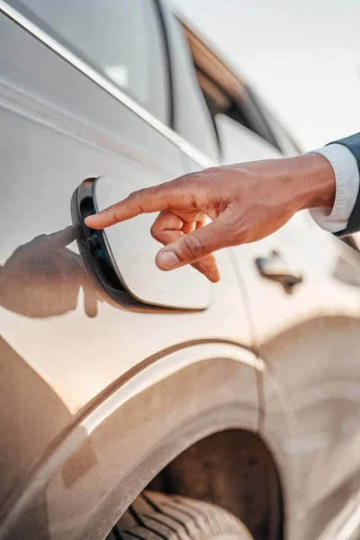 Shot of human hand opening fuel tank of car — Stock Photo, Image