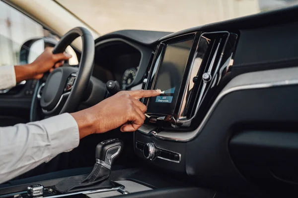 Shot of hand putting on panel of car — Stock Photo, Image