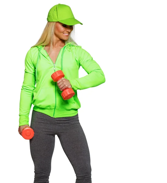 Blondie in green coat and grey panties with red dumbbells — Stock Photo, Image