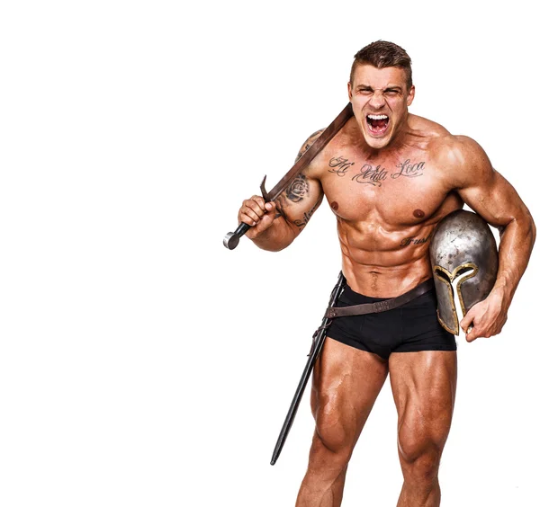 Hot warrior in black pants is holding sword in his shoulder and — Stock Photo, Image