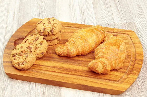 Delicious homemade croissants and cookies — Stock Photo, Image