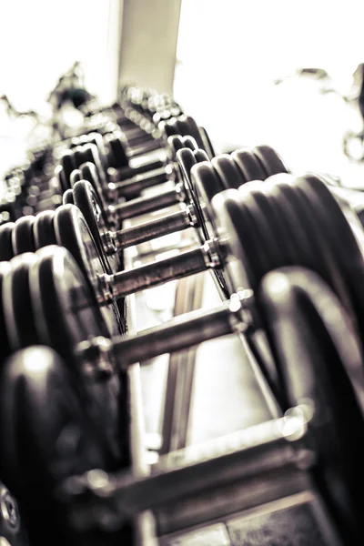 Colorless picture of heavy dumbbells — Stock Photo, Image