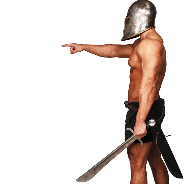 Side view of warrior who is pointing on someone — Stock Photo, Image