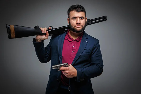 Poderoso hombre de negocios con pistola —  Fotos de Stock