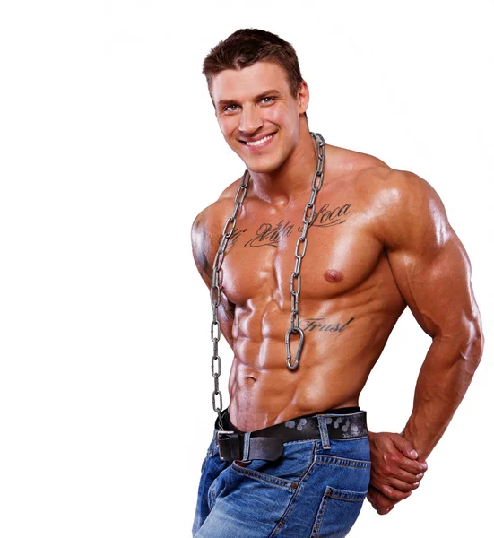 Portrait of man posing in studio with chain on neck — Stock Photo, Image