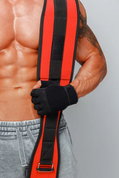 Muscular man bodybuilder poses — Stock Photo, Image