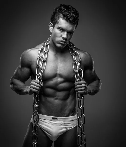 Brutal guy with steel chain — Stock Photo, Image