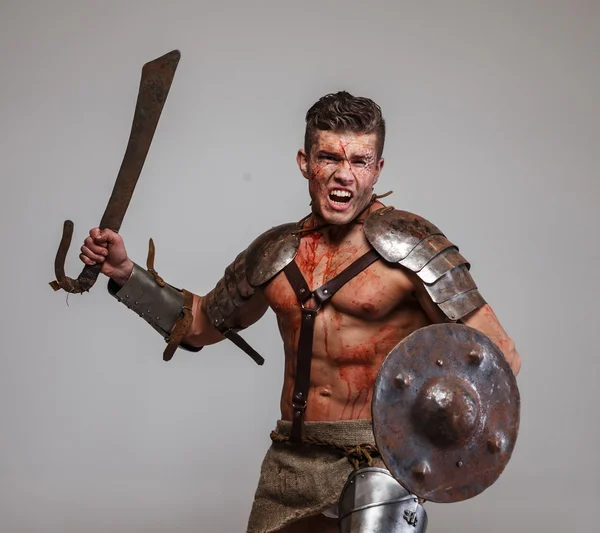 Gladiator in attack position — Stock Photo, Image